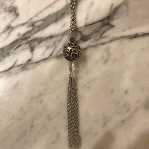 Silver chain necklace; measured from clasp to end of tassel 21.5 inches.